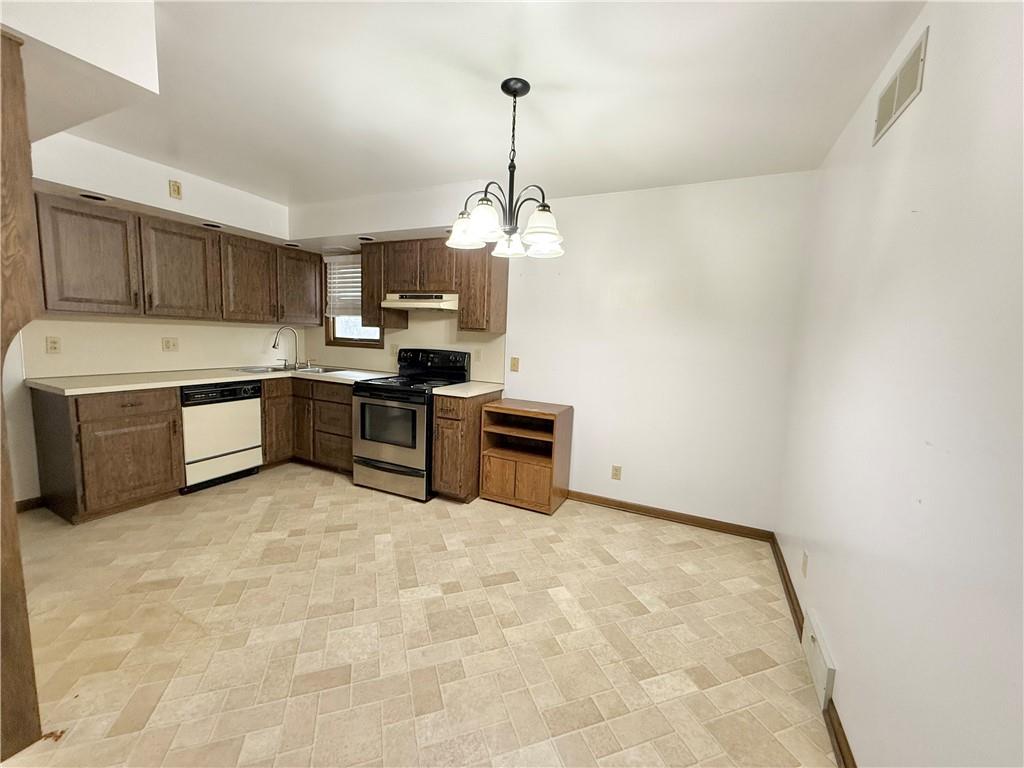 841 East Lutton Street New Castle, PA 16101 - Photo 6 of 12 a kitchen with sink cabinets and window