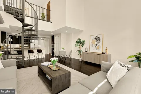 a living room with furniture and a couch