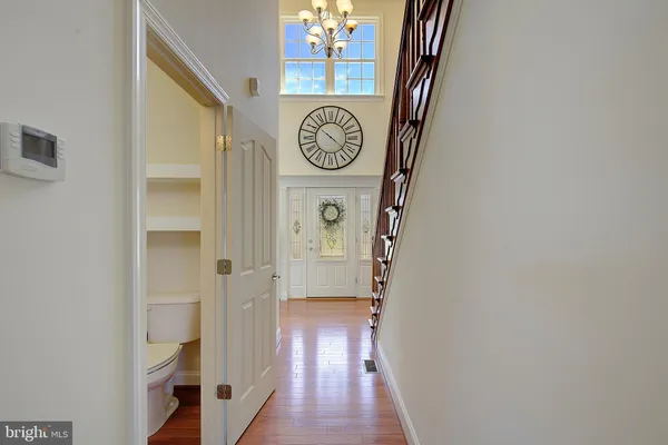 a view of entryway with stairs and furniture