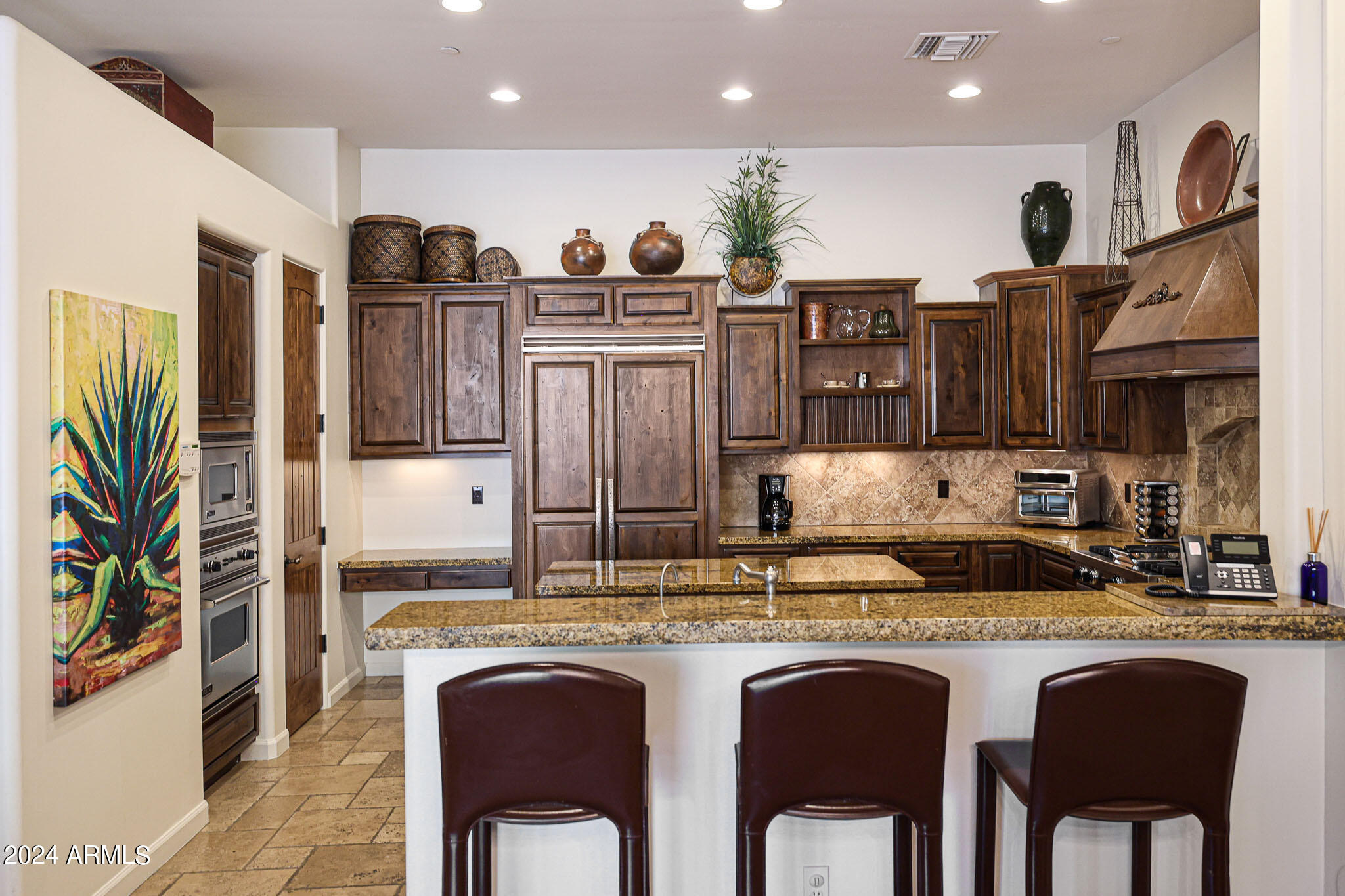 27440 North Alma School Parkway, Unit 363 Scottsdale, AZ 85262 - Photo 14 of 53 a kitchen with stainless steel appliances granite countertop a sink and cabinets