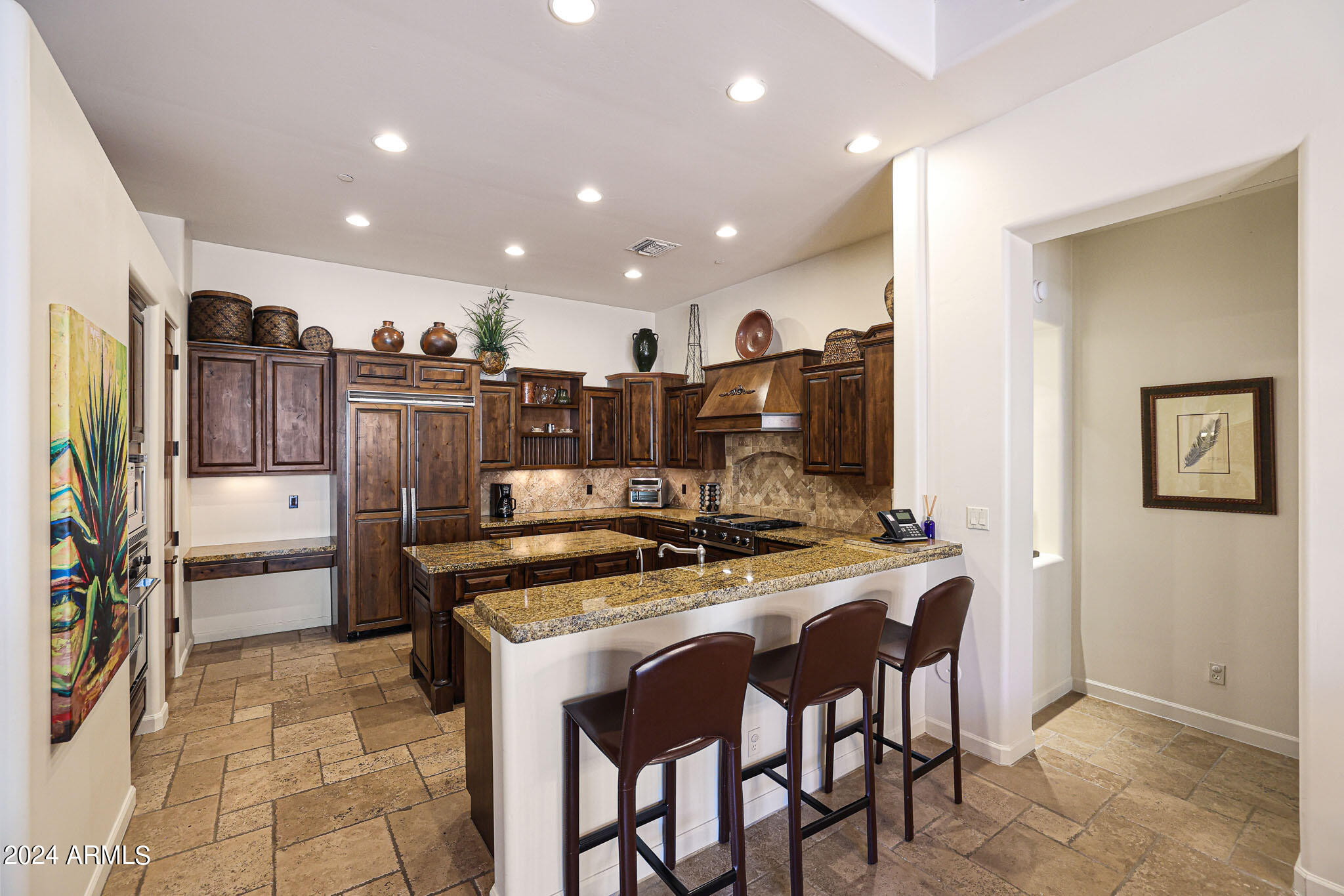 27440 North Alma School Parkway, Unit 363 Scottsdale, AZ 85262 - Photo 15 of 53 a kitchen with stainless steel appliances granite countertop a stove a refrigerator and a refrigerator