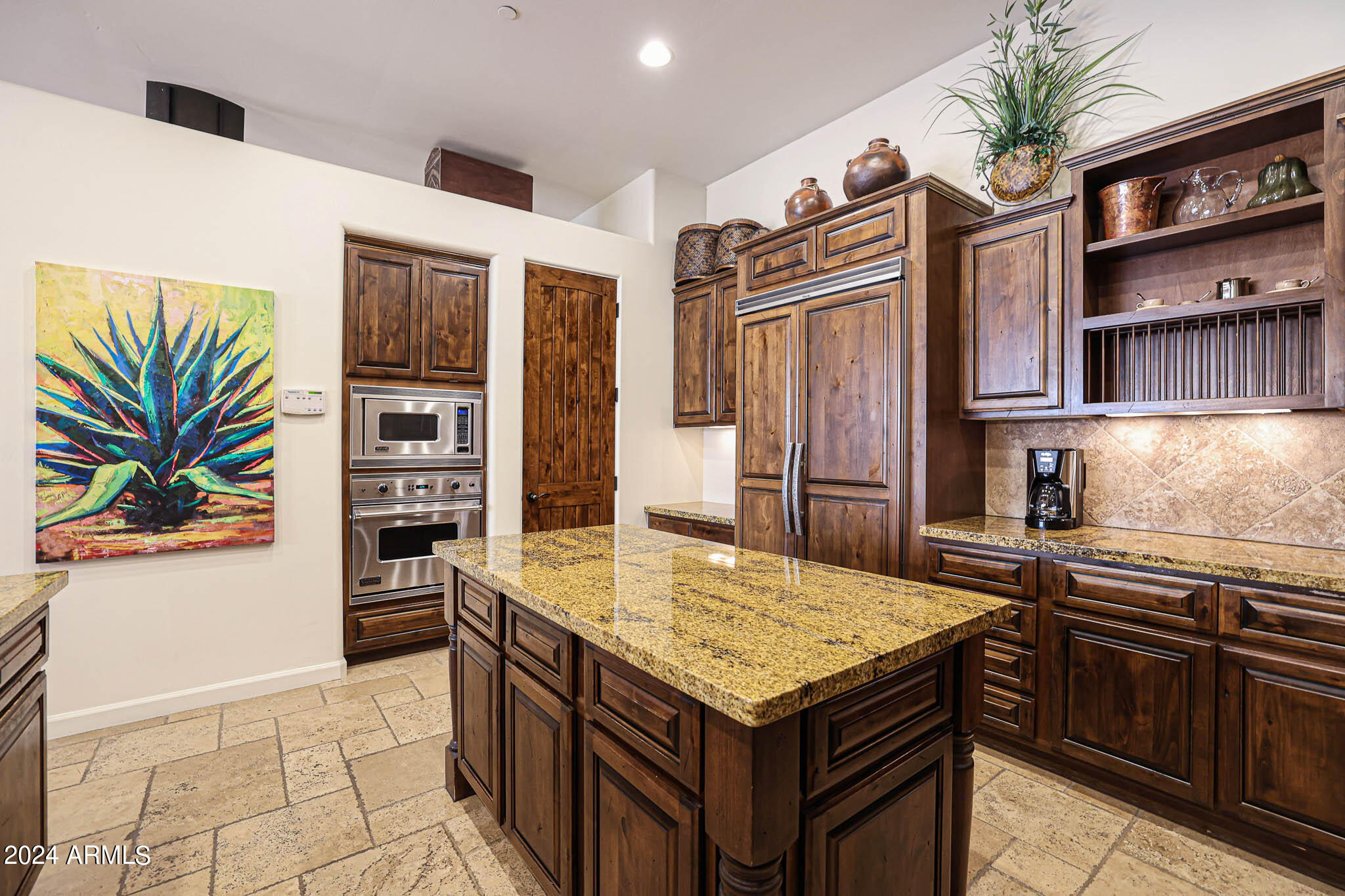 27440 North Alma School Parkway, Unit 363 Scottsdale, AZ 85262 - Photo 18 of 53 a kitchen with stainless steel appliances granite countertop a sink stove and refrigerator