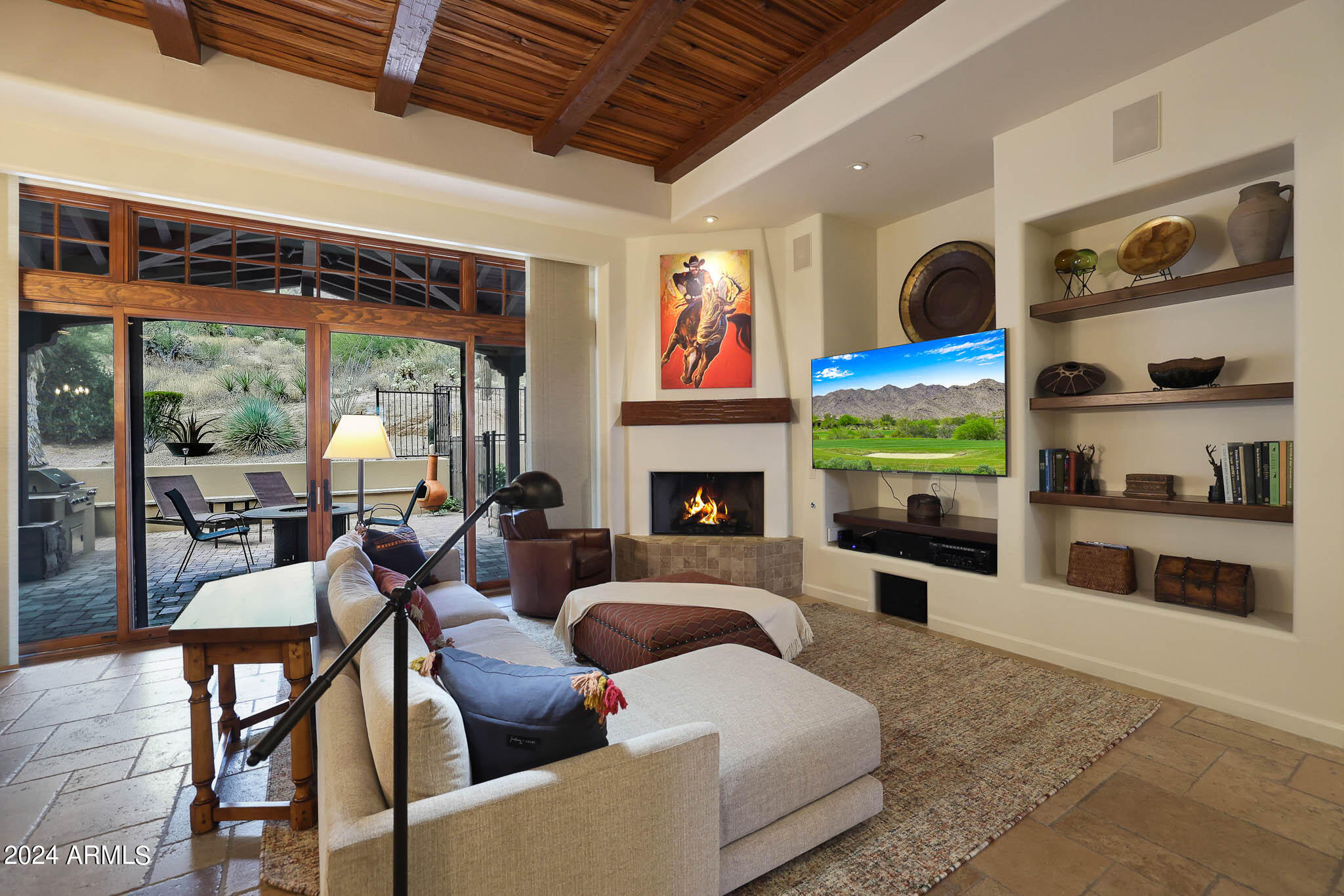 27440 North Alma School Parkway, Unit 363 Scottsdale, AZ 85262 - Photo 21 of 53 a living room with furniture fireplace and flat screen tv