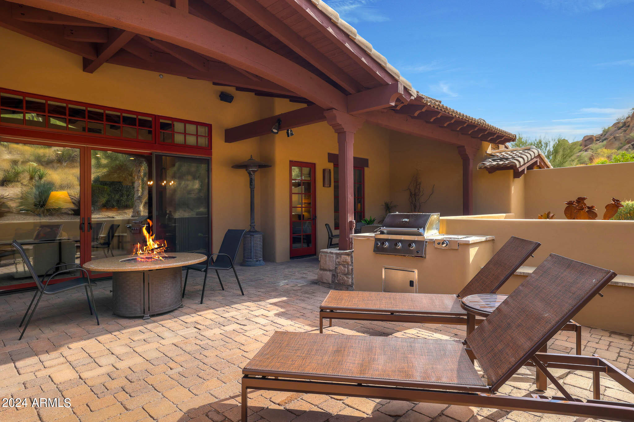 27440 North Alma School Parkway, Unit 363 Scottsdale, AZ 85262 - Photo 36 of 53 a view of a chairs and table in a patio