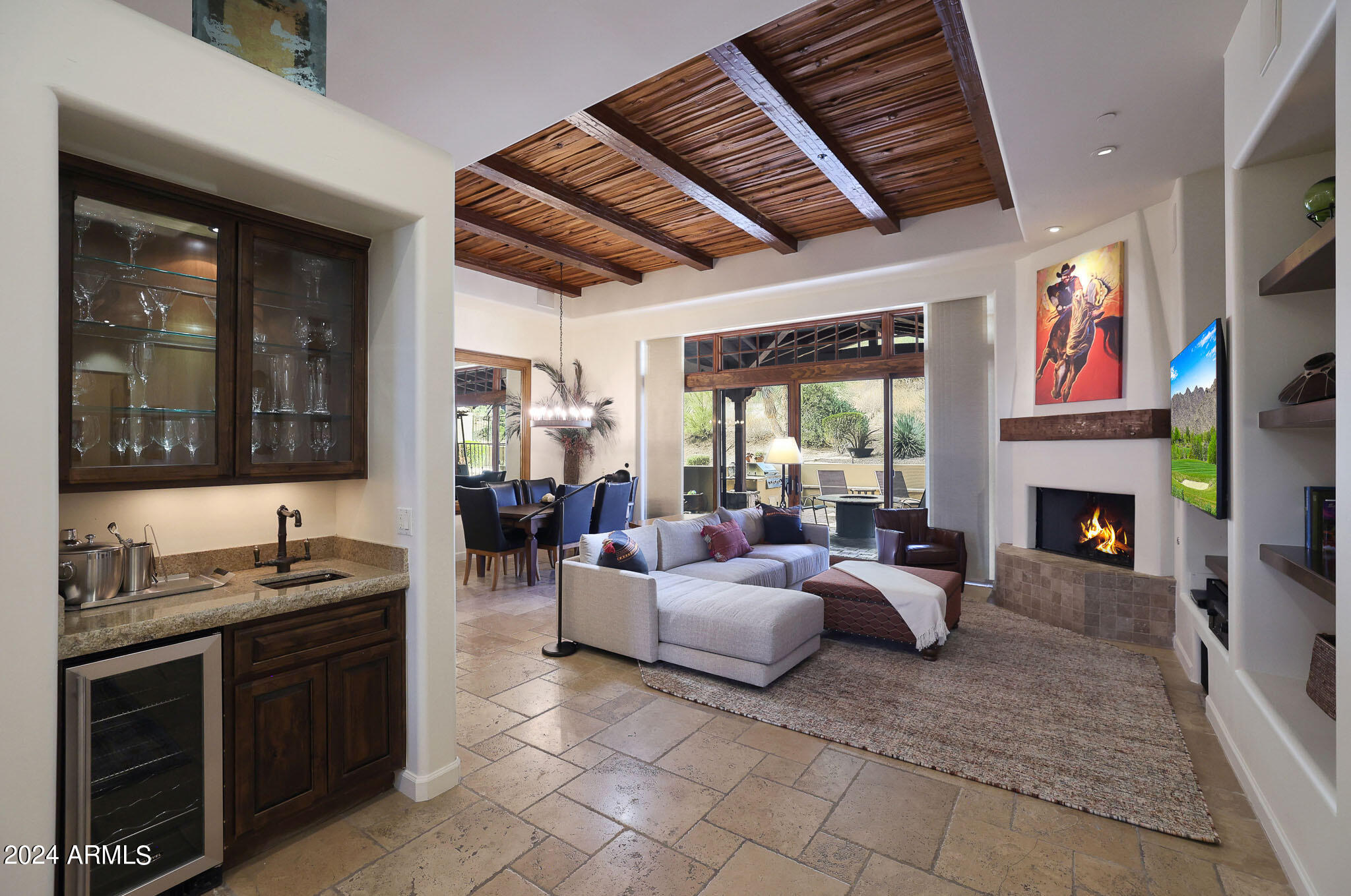 27440 North Alma School Parkway, Unit 363 Scottsdale, AZ 85262 - Photo 6 of 53 a living room with furniture a fireplace and a flat screen tv