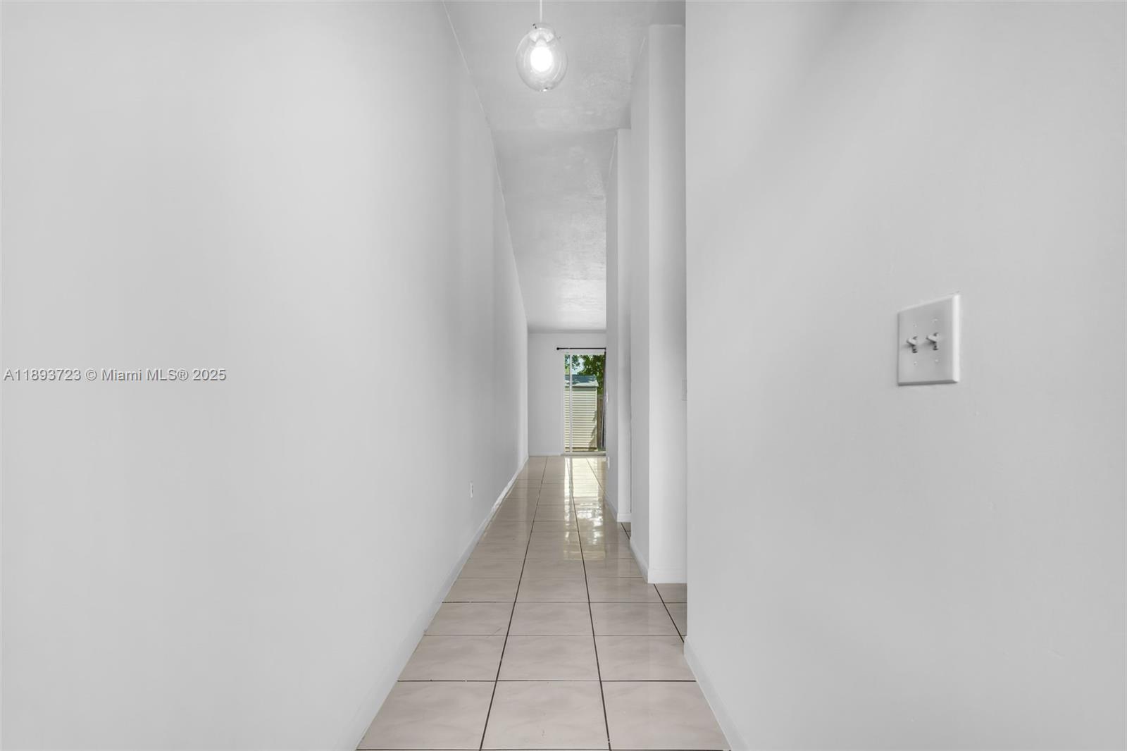 6713 Northwest 188th Terrace, Unit 6713 Hialeah, FL 33015 - Photo 9 of 28 a view of a hallway