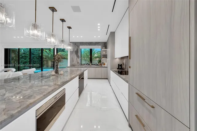 a bedroom with a bed and cabinets