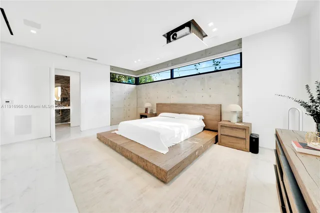 a bathroom with a double vanity sink and a bathtub