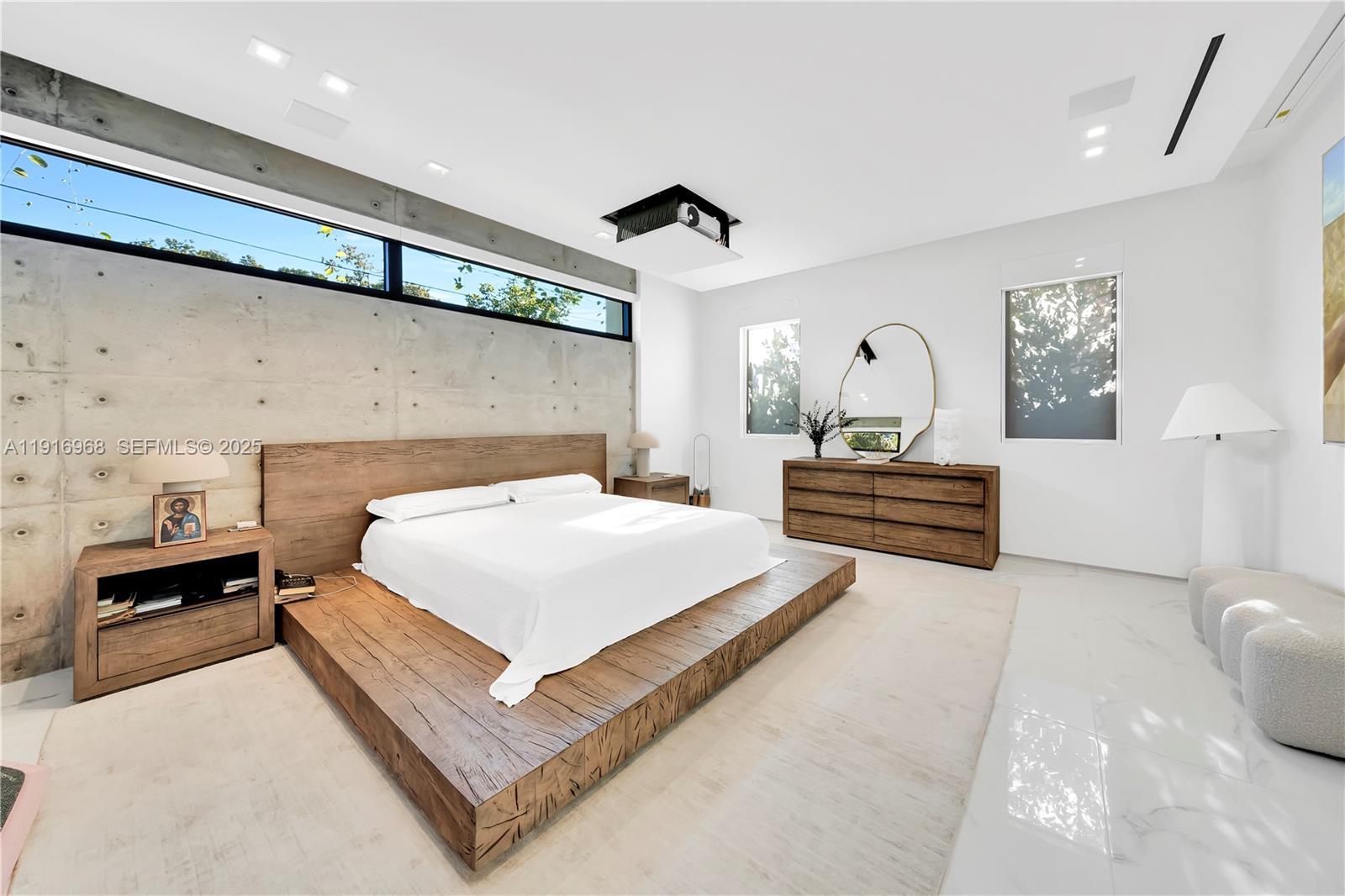 34 Southwest 26th Road Miami, FL 33129 - Photo 38 of 68 a bedroom with a bed and a large window