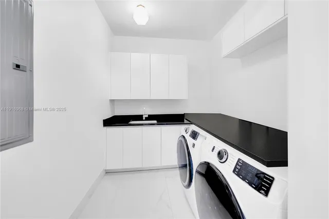 aerial view of a house with yard