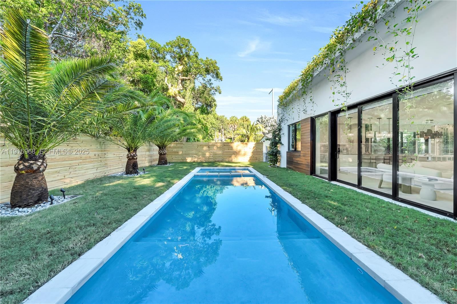 34 Southwest 26th Road Miami, FL 33129 - Photo 60 of 68 a view of a backyard with a garden