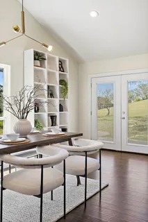 a room with furniture and window