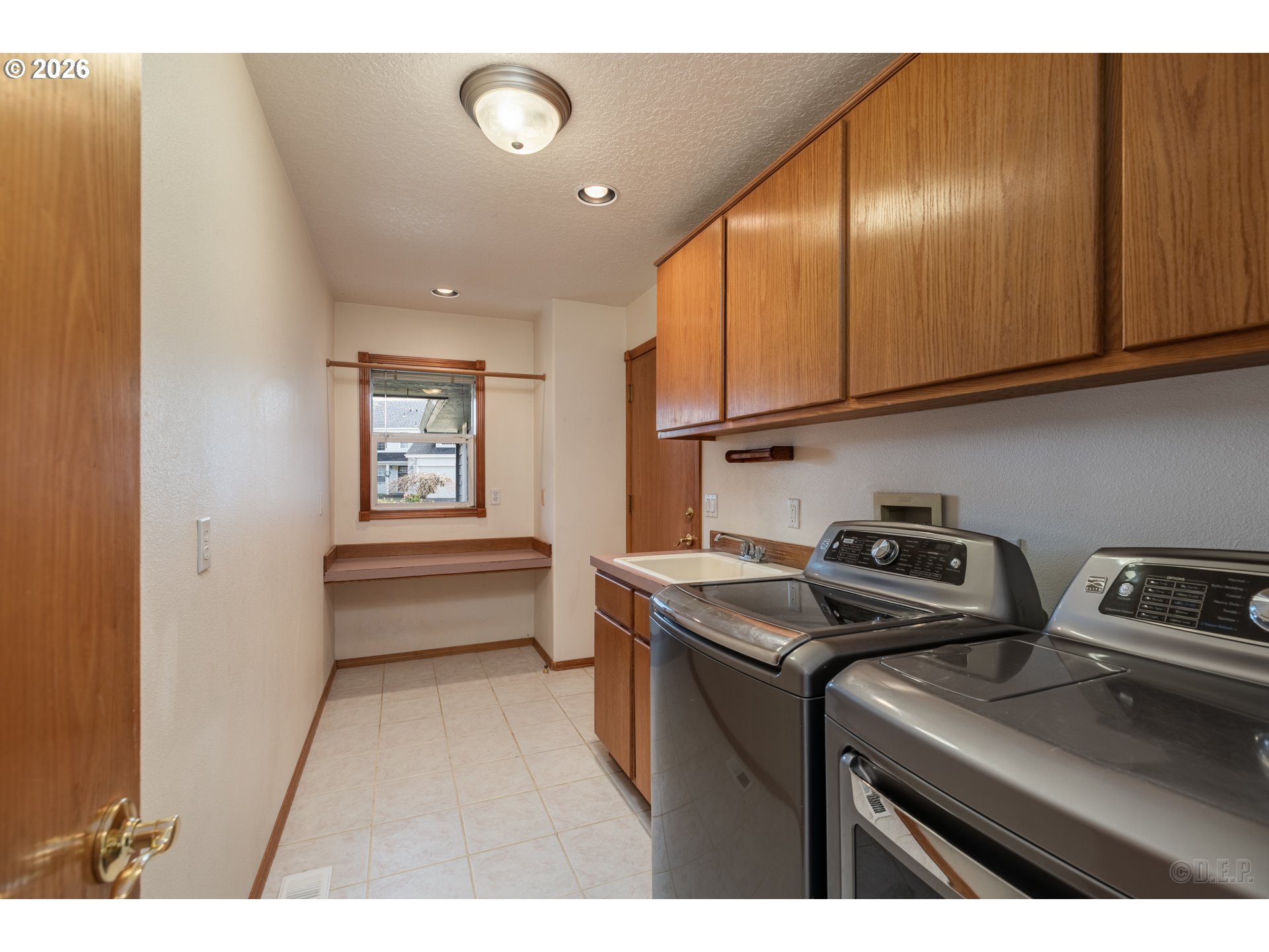 33221 Linden Street Scappoose, OR 97056 - Photo 17 of 35 a kitchen that has a sink and a stove