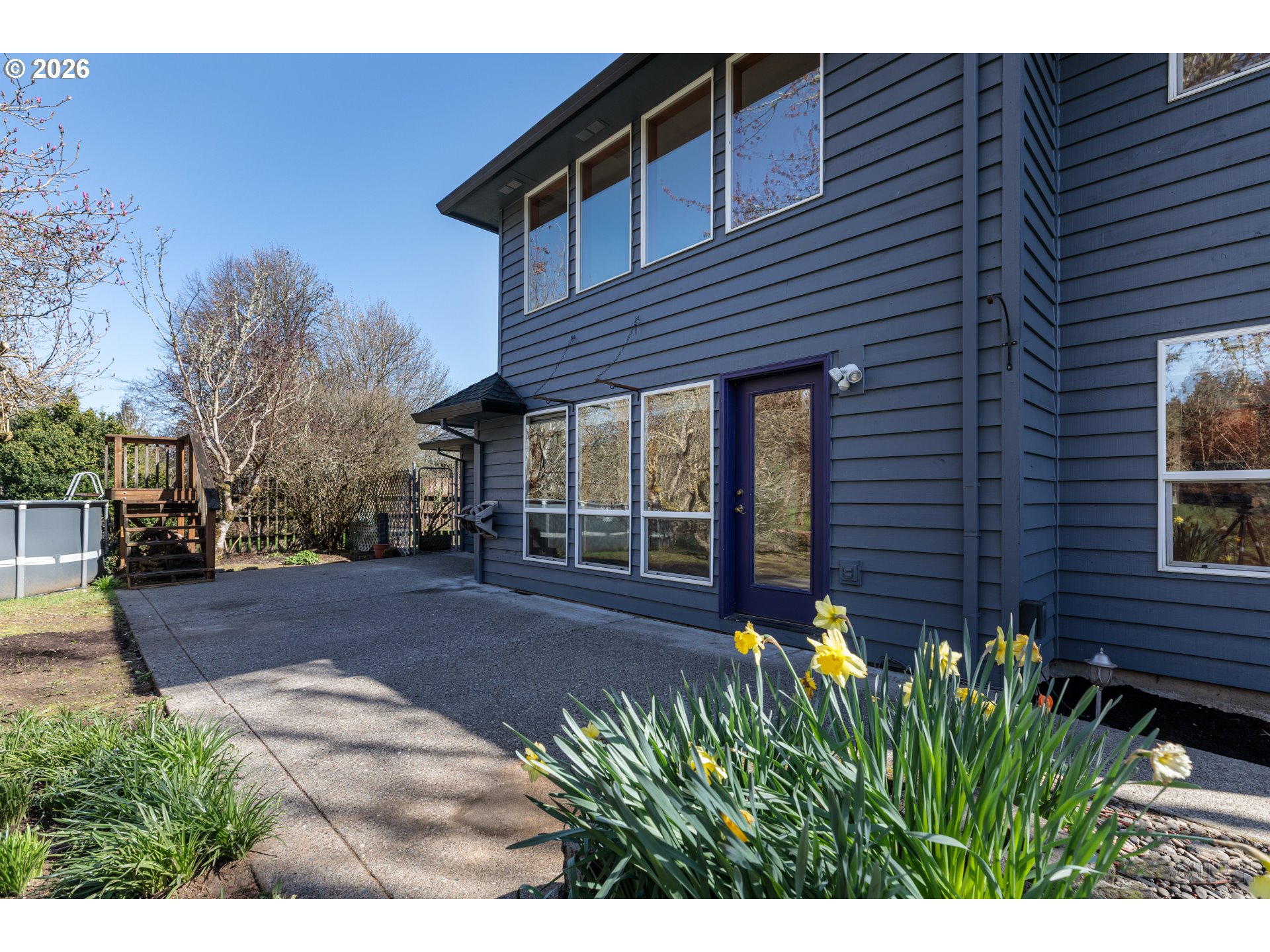 33221 Linden Street Scappoose, OR 97056 - Photo 23 of 35 a front view of a house with garden