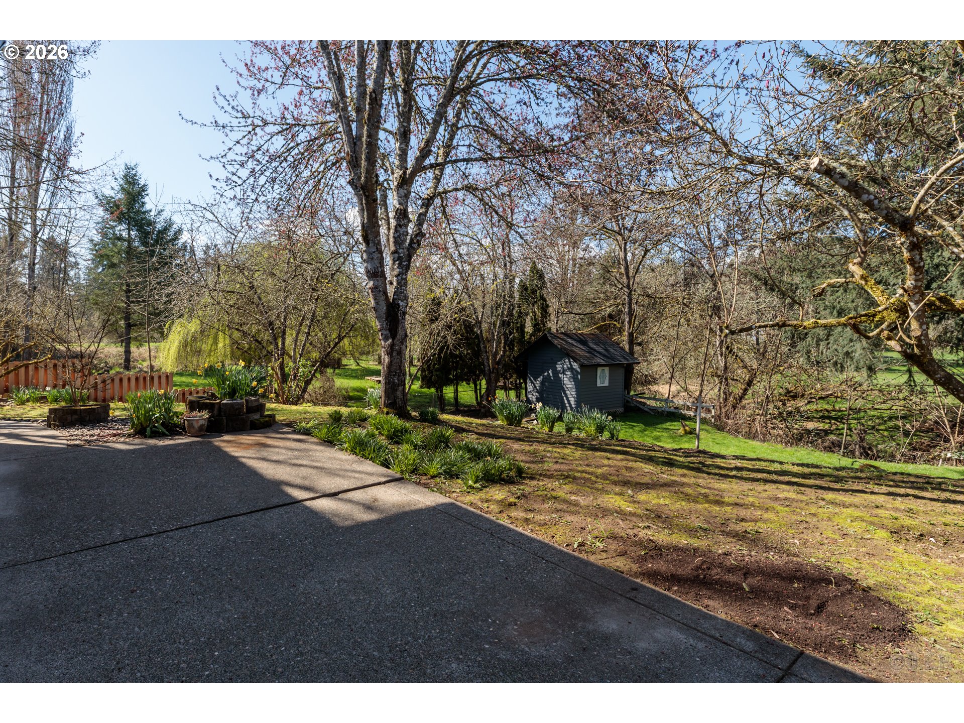 33221 Linden Street Scappoose, OR 97056 - Photo 26 of 35 a view of a yard with an trees