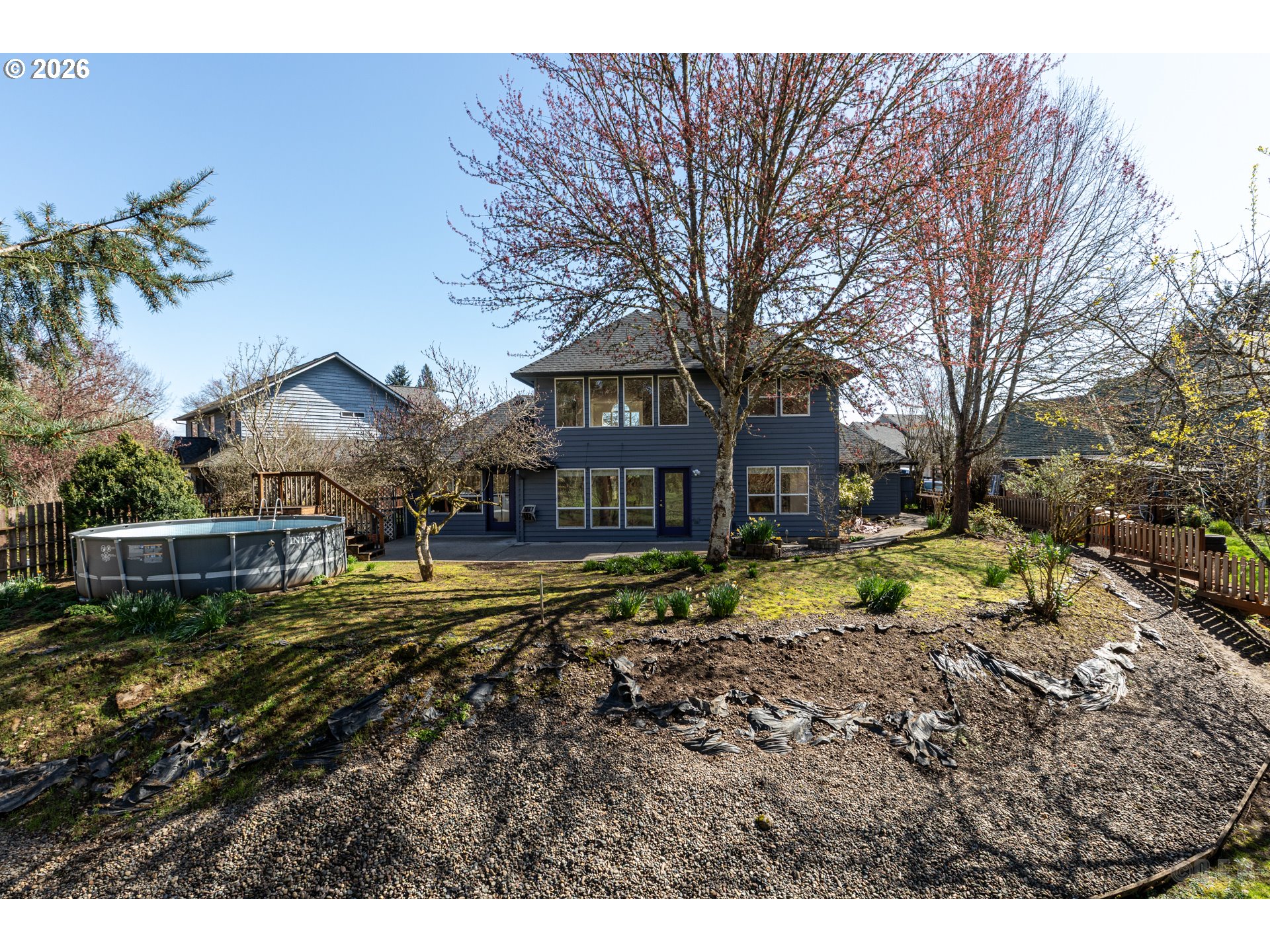 33221 Linden Street Scappoose, OR 97056 - Photo 28 of 35 a front view of a house with a yard
