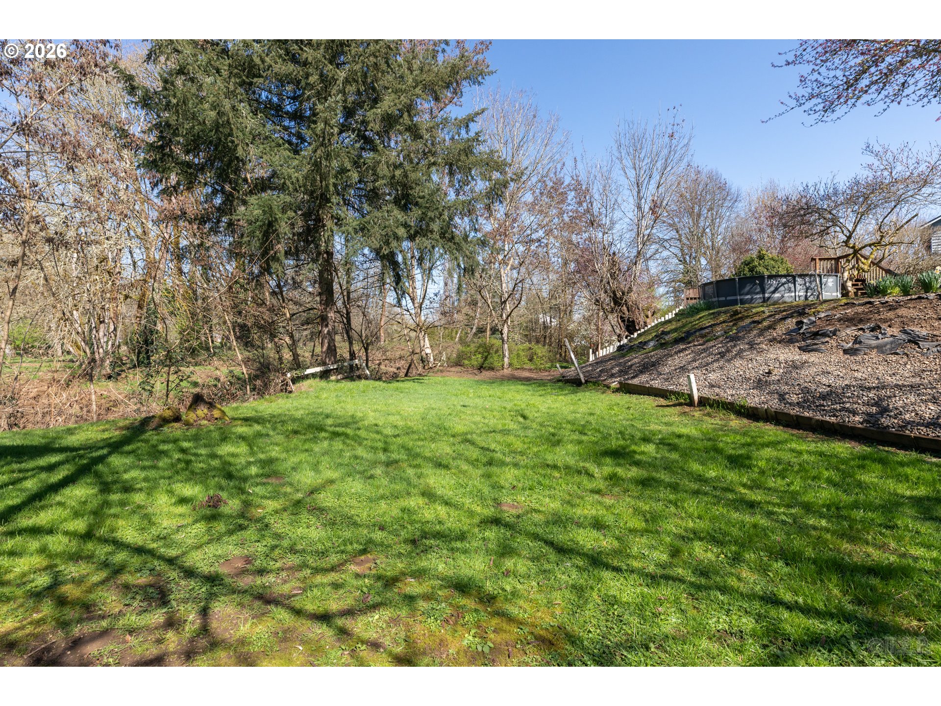 33221 Linden Street Scappoose, OR 97056 - Photo 29 of 35 a view of a yard with an tree