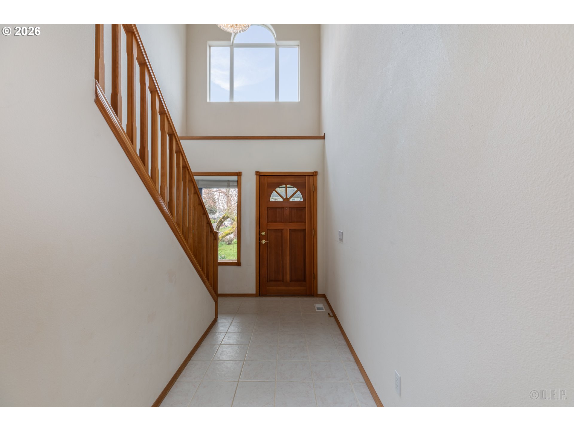 33221 Linden Street Scappoose, OR 97056 - Photo 4 of 35 a view of an entryway with wooden floor
