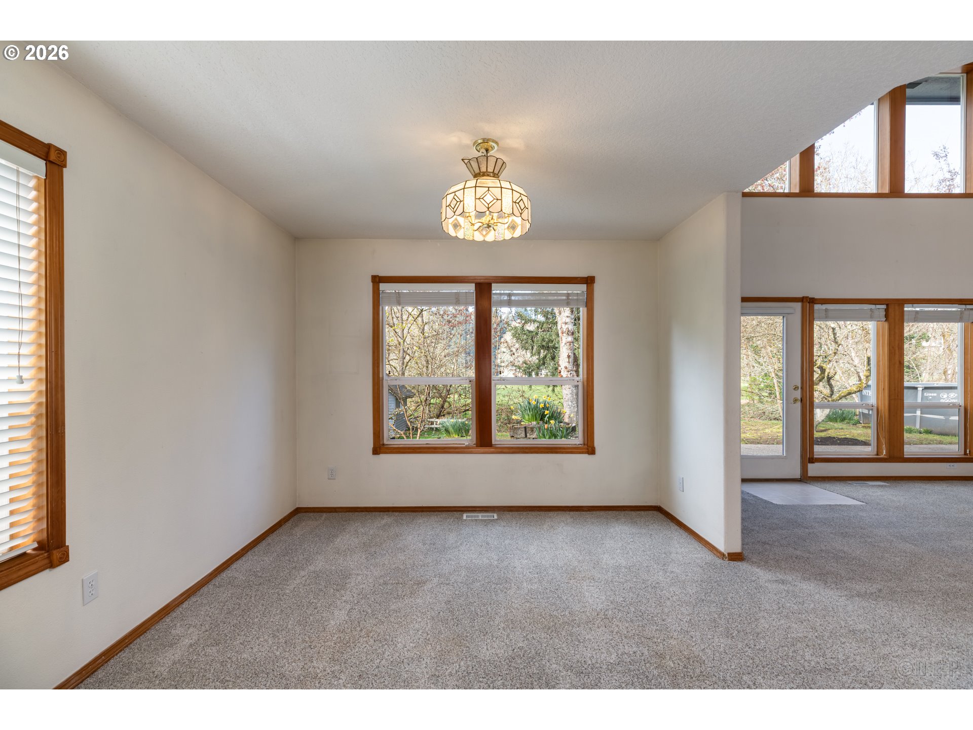 33221 Linden Street Scappoose, OR 97056 - Photo 9 of 35 a view of an empty room with a window