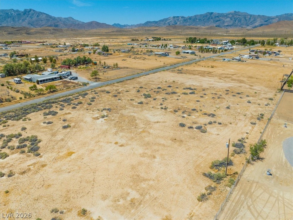 4580 Lawrence Road Pahrump, NV 89048 - Photo 23 of 40 Unleash your vision across this expansive, undeveloped desert canvas, framed by distant mountains.