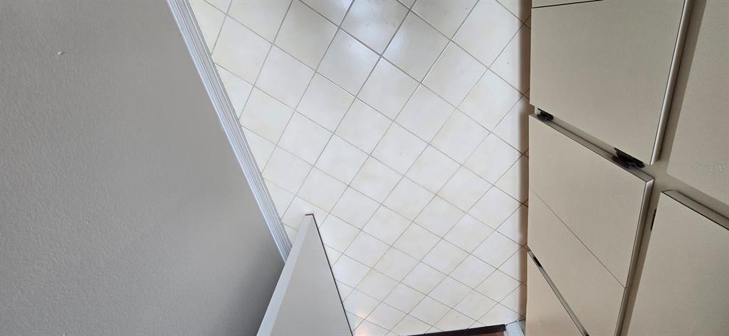 2710 Southwest 152nd Lane Ocala, FL 34473 - Photo 10 of 19 a bathroom with a white wall and shower