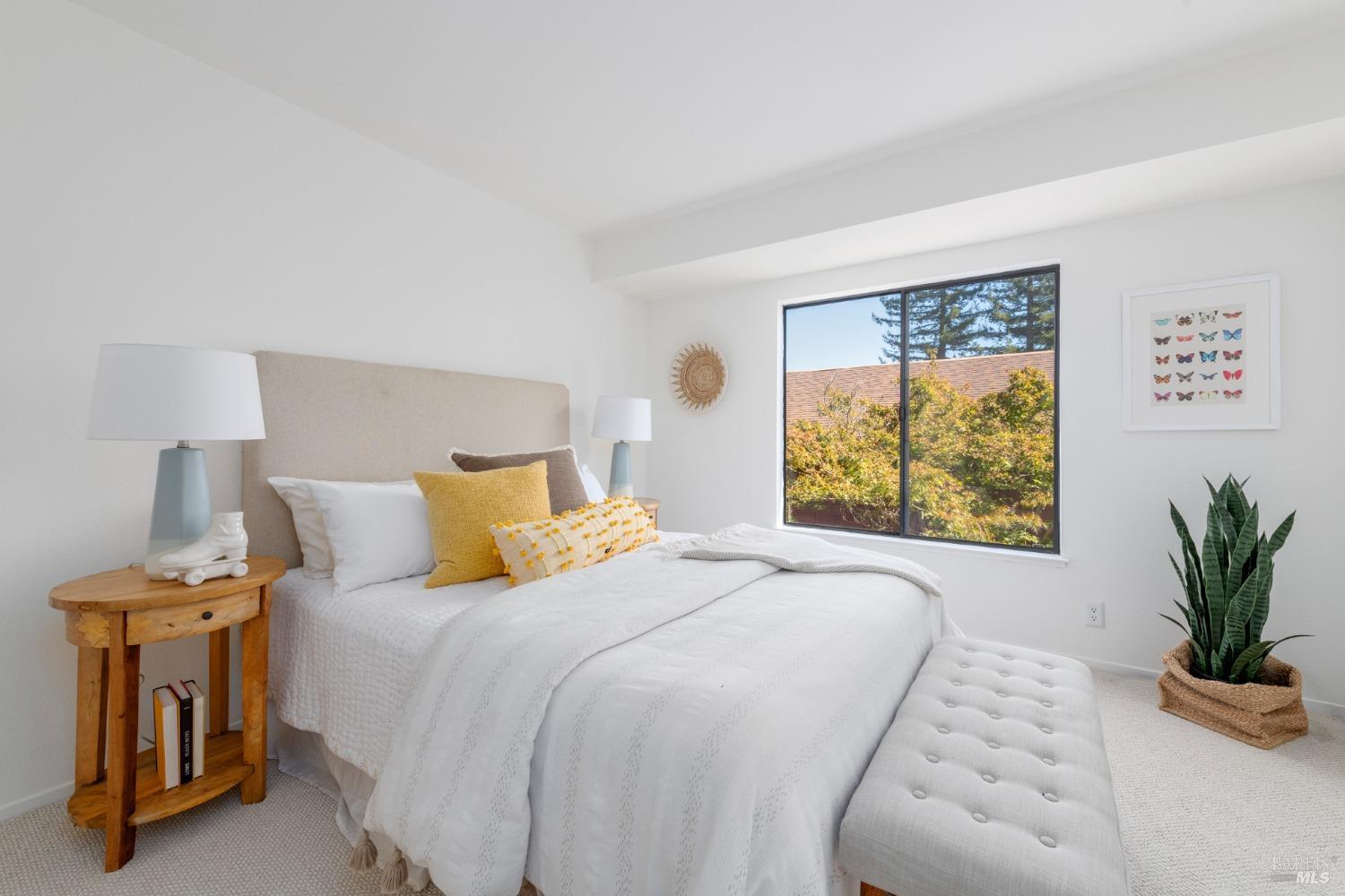 968 Arlene Way Novato, CA 94947 - Photo 15 of 32 a bedroom with a bed and a potted plant