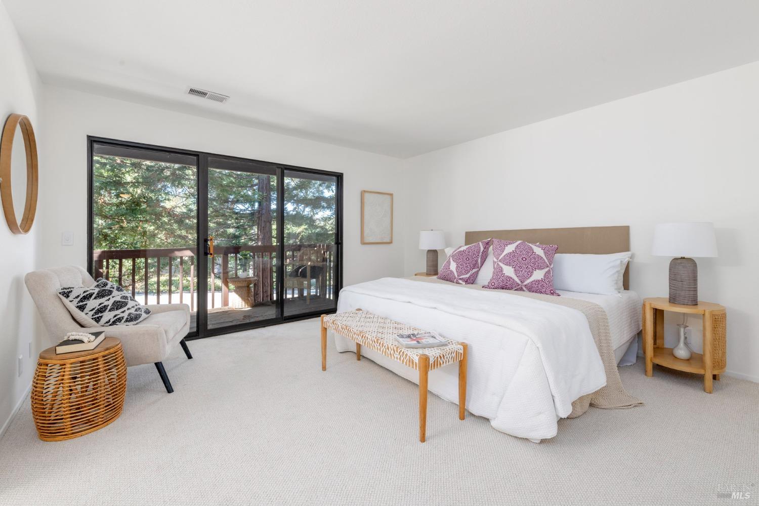 968 Arlene Way Novato, CA 94947 - Photo 22 of 32 a spacious bedroom with a bed and a couch