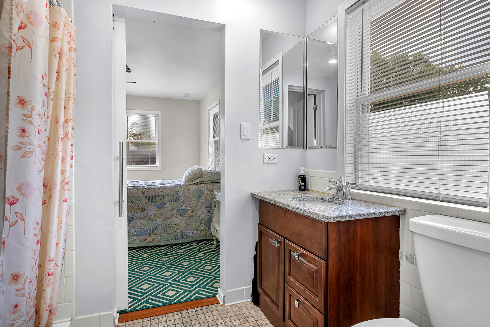 17803 Escanaba Avenue Lansing, IL 60438 - Photo 19 of 31 a bathroom with a sink and a mirror