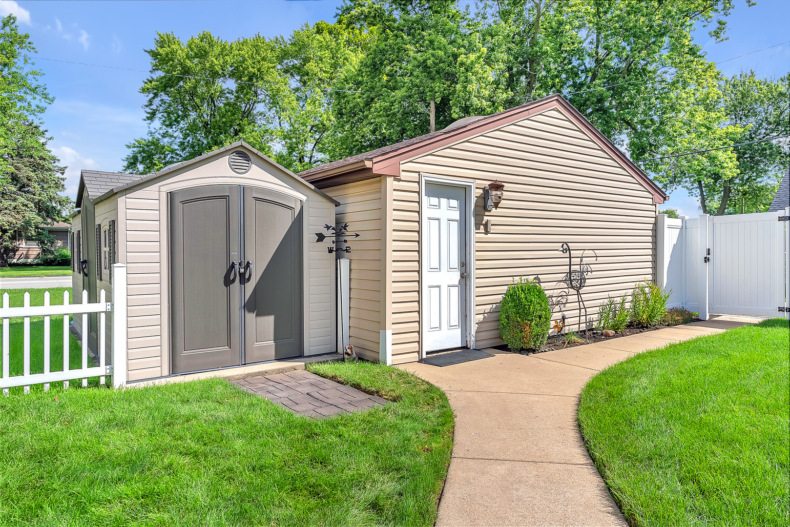 17803 Escanaba Avenue Lansing, IL 60438 - Photo 28 of 31 a front view of a house with a yard