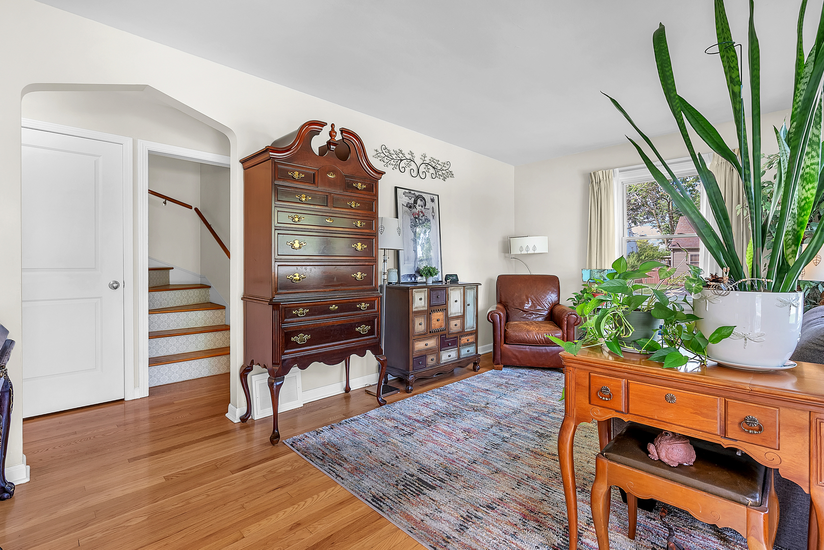 17803 Escanaba Avenue Lansing, IL 60438 - Photo 5 of 31 a living room with furniture and a wooden floor