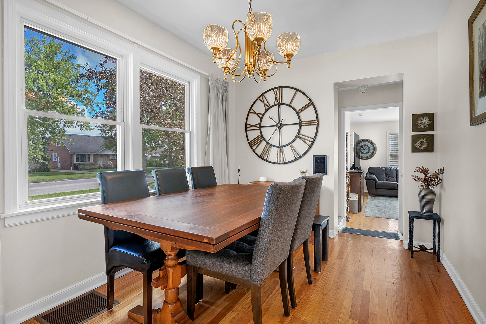 17803 Escanaba Avenue Lansing, IL 60438 - Photo 6 of 31 a view of a dining room with furniture window and wooden floor