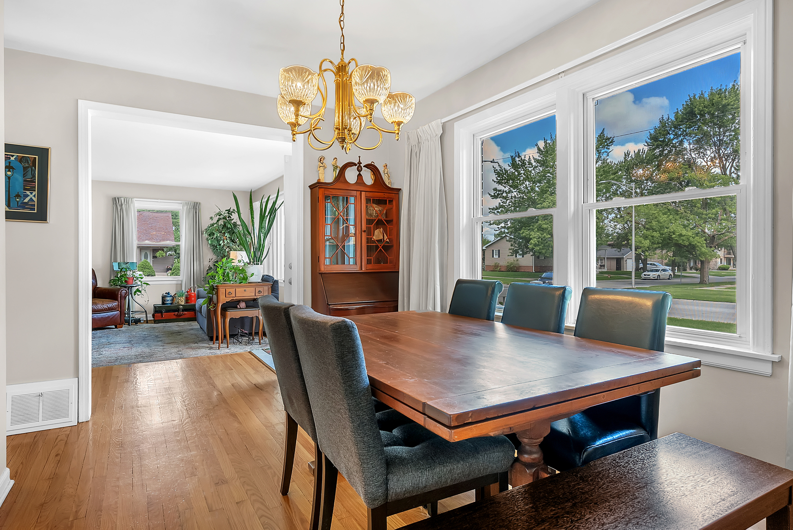 17803 Escanaba Avenue Lansing, IL 60438 - Photo 7 of 31 a view of a dining room with furniture window and wooden floor