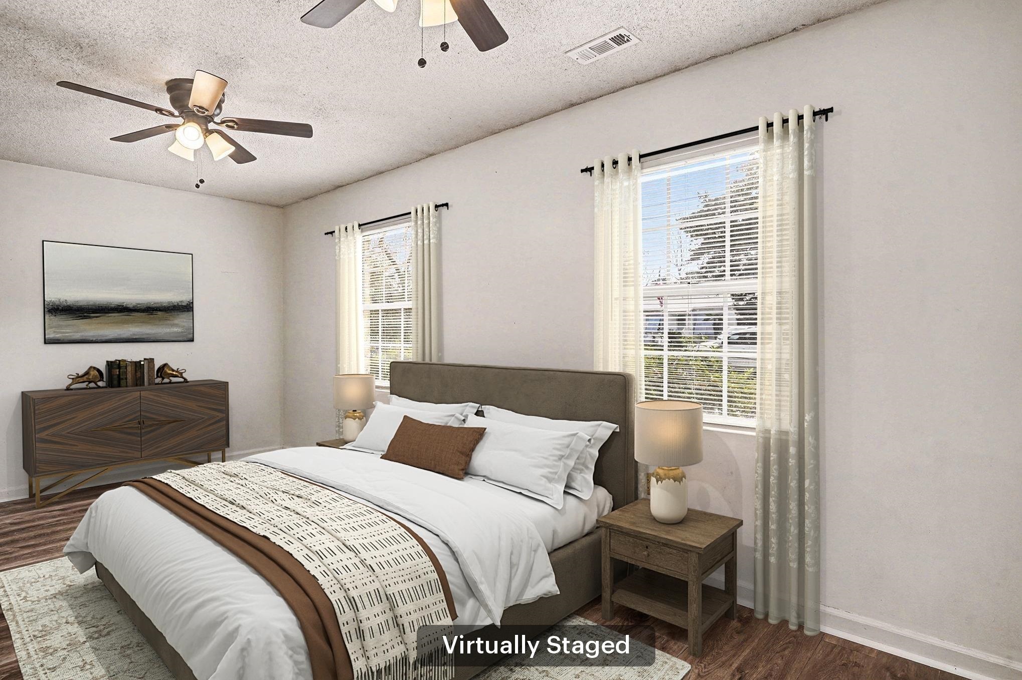 916 Brinkley Street Georgetown, SC 29440 - Photo 16 of 39 Bedroom featuring dark wood-style flooring, a textured ceiling, and ceiling fan