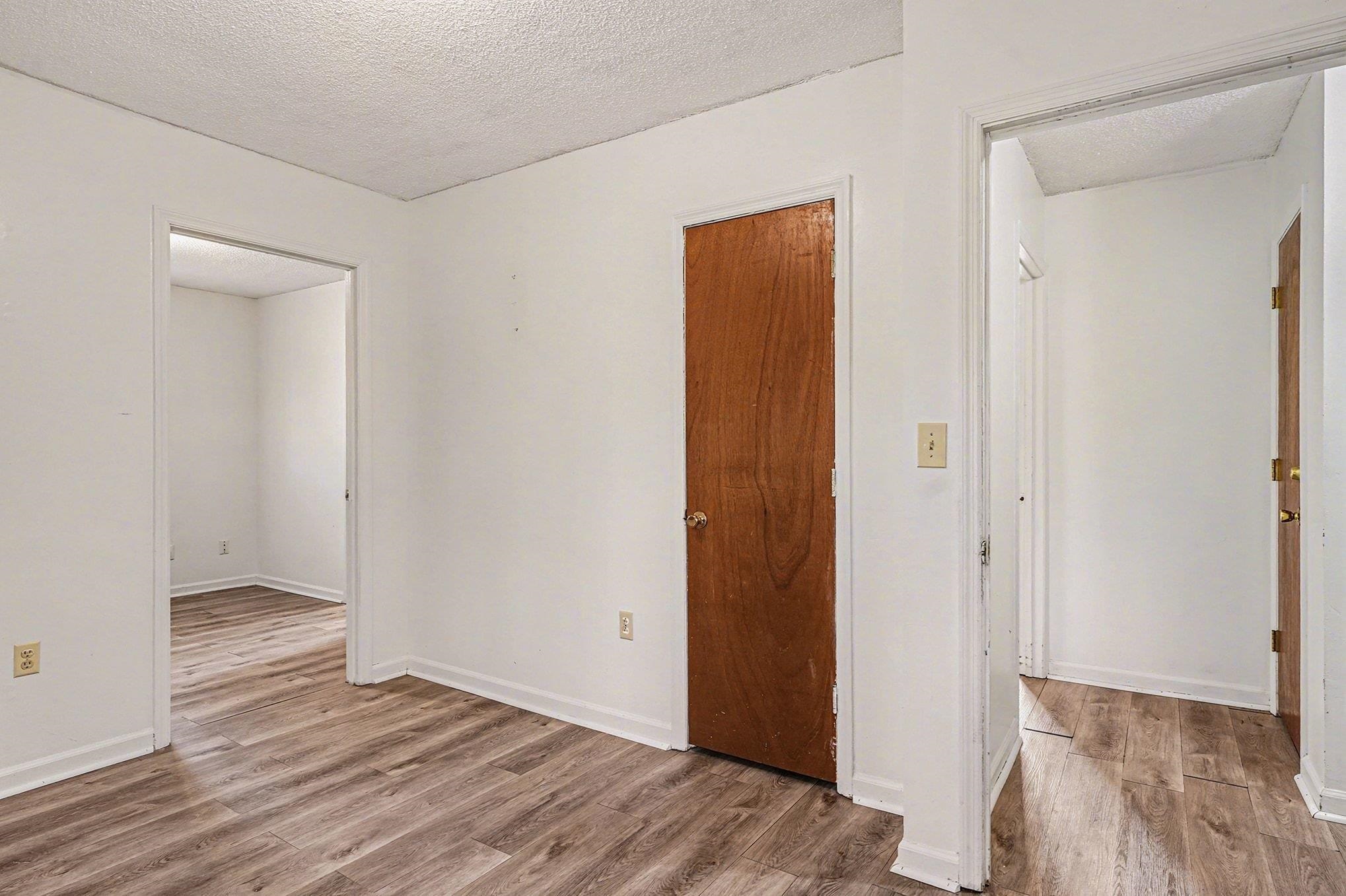 916 Brinkley Street Georgetown, SC 29440 - Photo 24 of 39 Unfurnished room featuring a textured ceiling and light wood finished floors