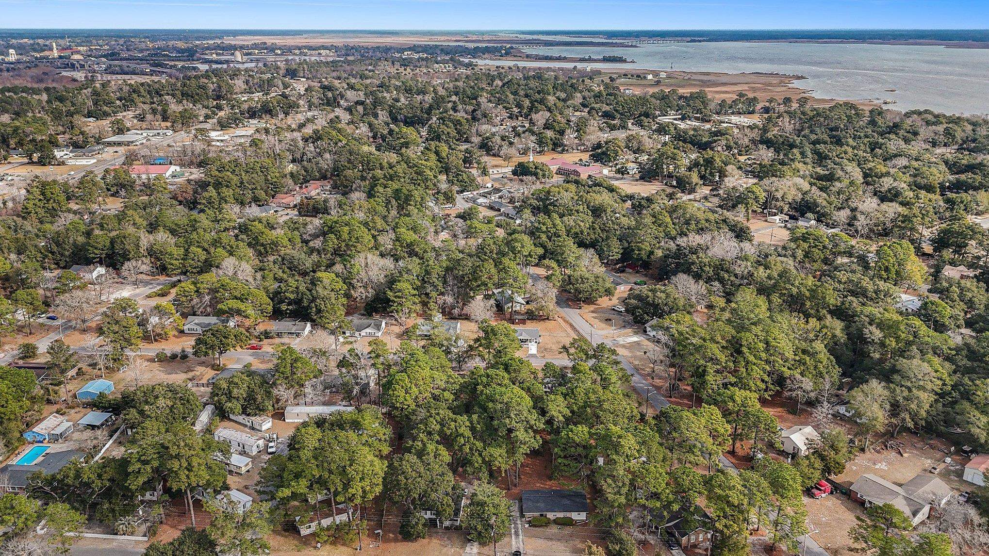 916 Brinkley Street Georgetown, SC 29440 - Photo 32 of 39 Aerial view of property and surrounding area with a nearby body of water and nearby suburban area