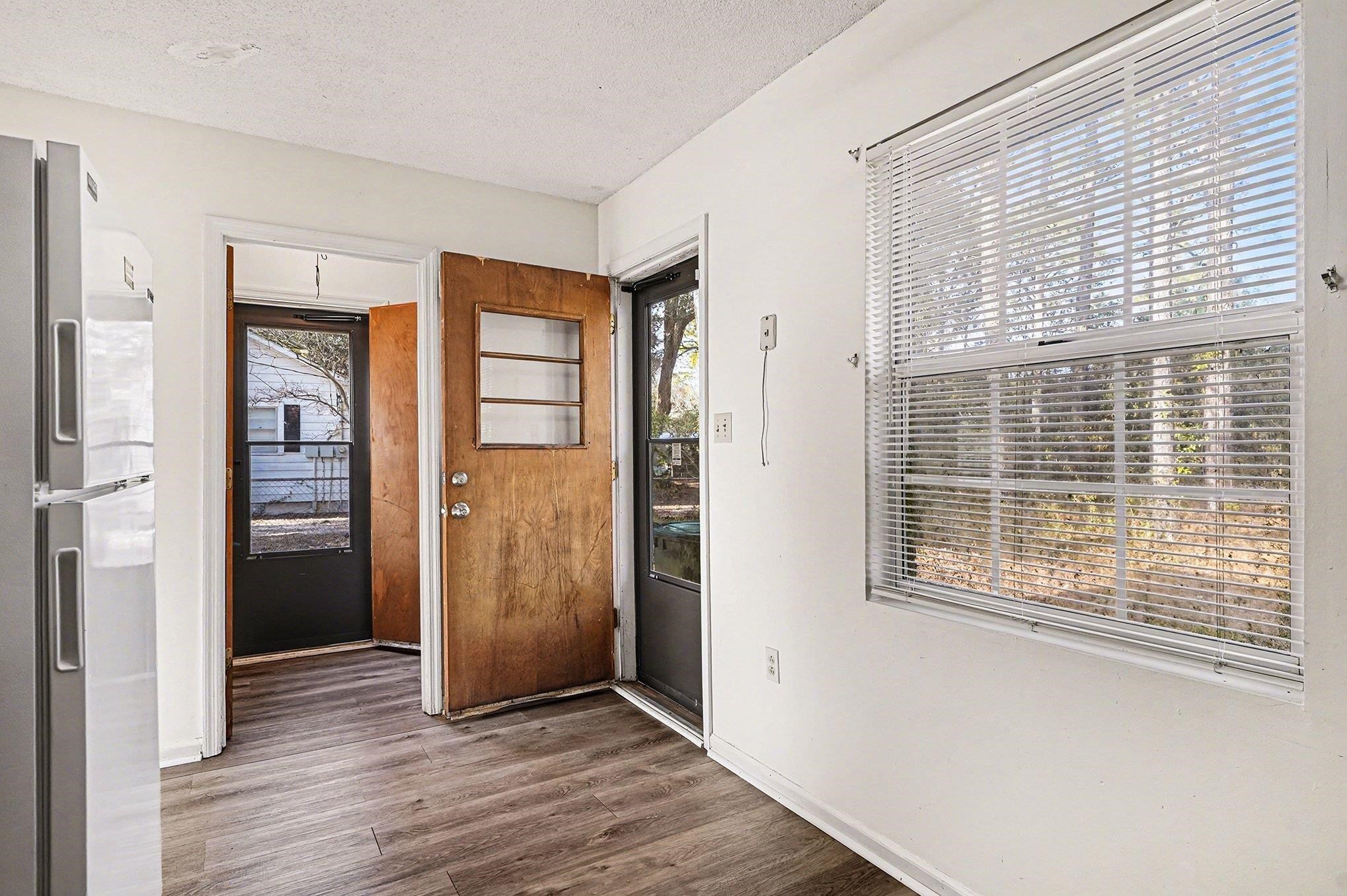 916 Brinkley Street Georgetown, SC 29440 - Photo 8 of 39 Foyer featuring dark wood finished floors and a textured ceiling