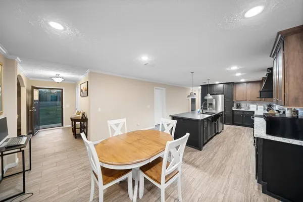 a view of a dining room with furniture