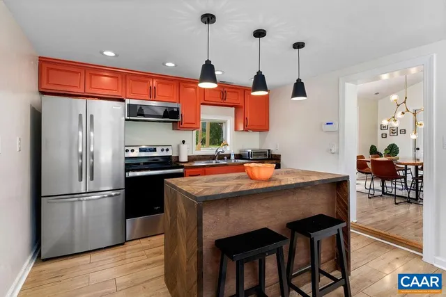 a kitchen with a stove and a sink