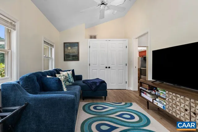 a bedroom with a bed and a table