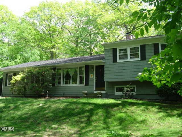 88 Aspen Ledges Road Ridgefield, CT 06877 - Photo 1 of 1 front view of a house with a yard