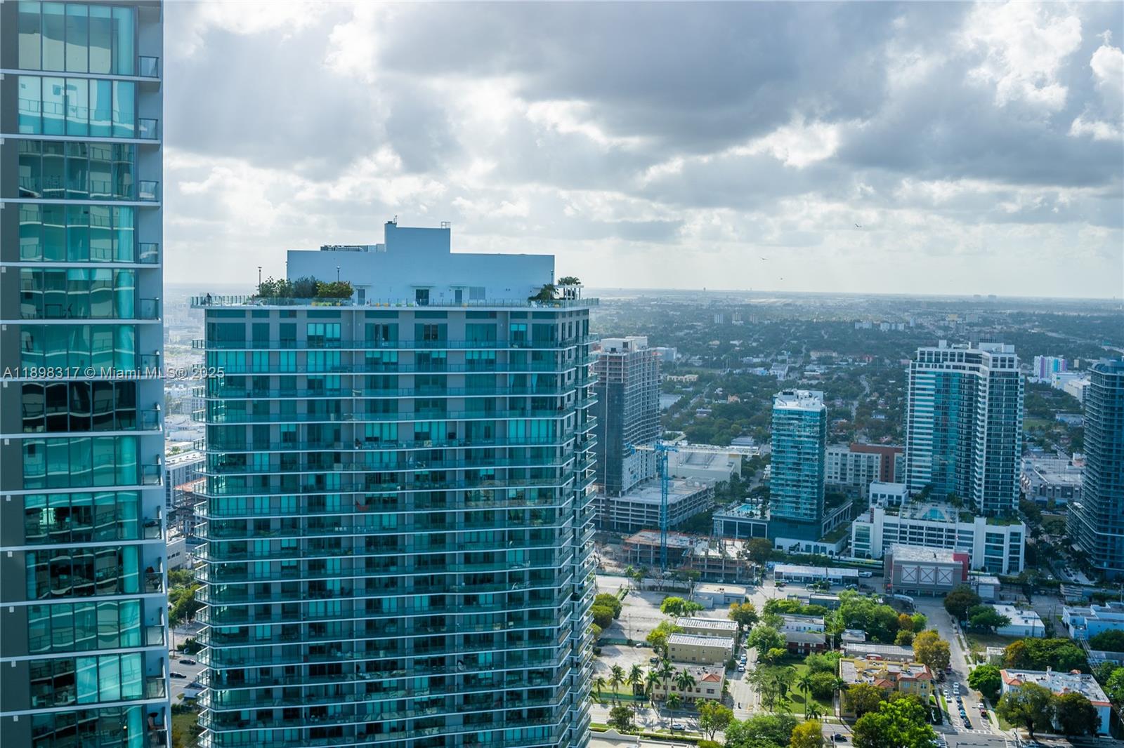 3131 Northeast 7th Avenue, Unit PH4903 Miami, FL 33137 - Photo 14 of 33 a view of a city with tall buildings