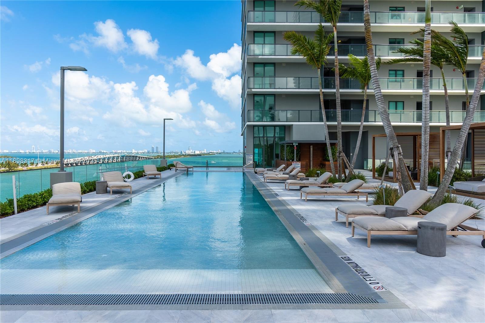 3131 Northeast 7th Avenue, Unit PH4903 Miami, FL 33137 - Photo 15 of 33 a view of a swimming pool with a patio