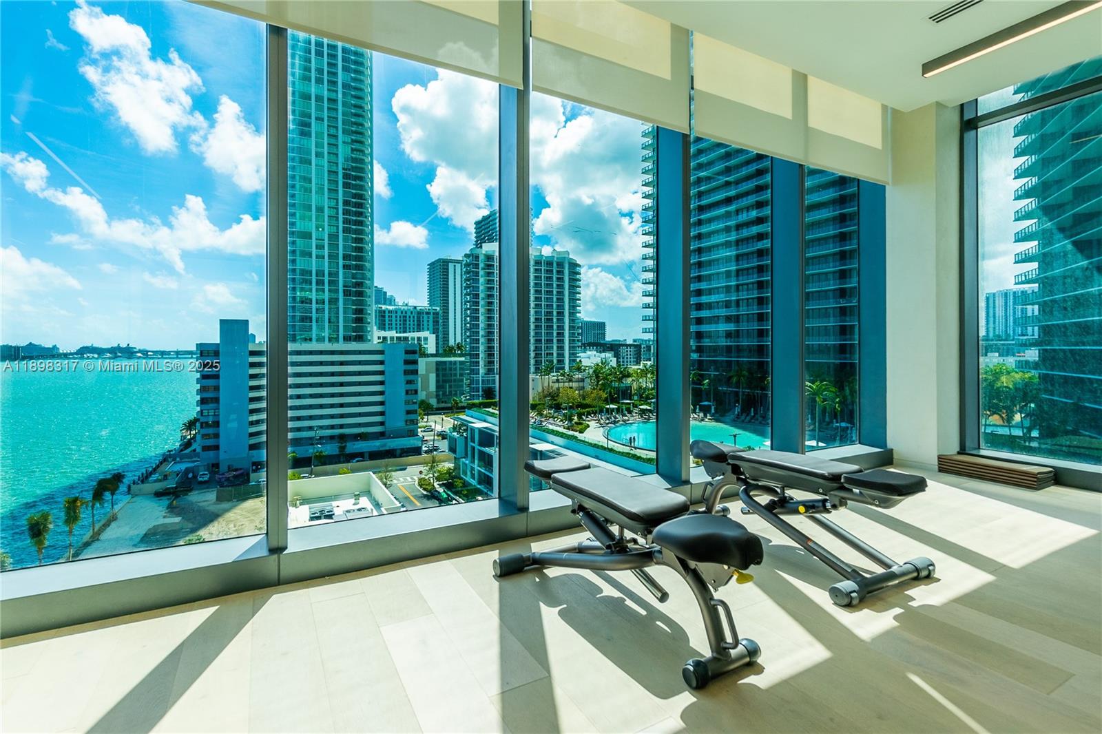 3131 Northeast 7th Avenue, Unit PH4903 Miami, FL 33137 - Photo 21 of 33 a view of a balcony with chairs