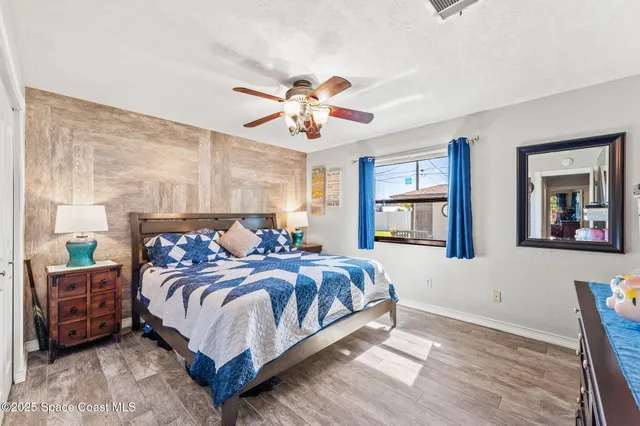 a bathroom with a double vanity sink toilet and shower