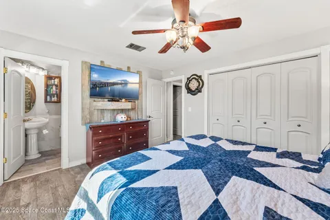 a view of a house with swimming pool and a yard