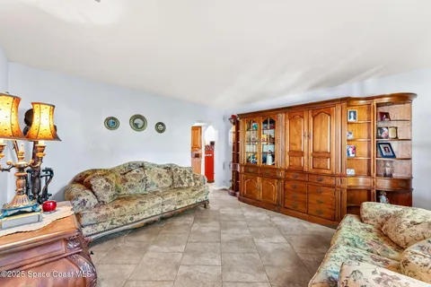 a very nice looking dining room with a large window