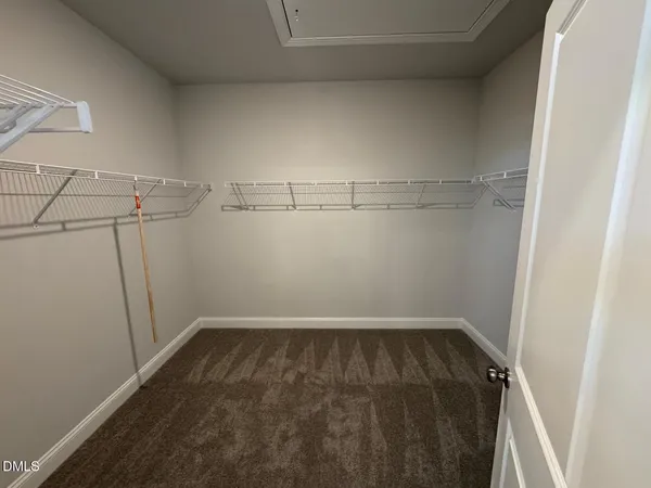 a bathroom with a double vanity sink and mirror