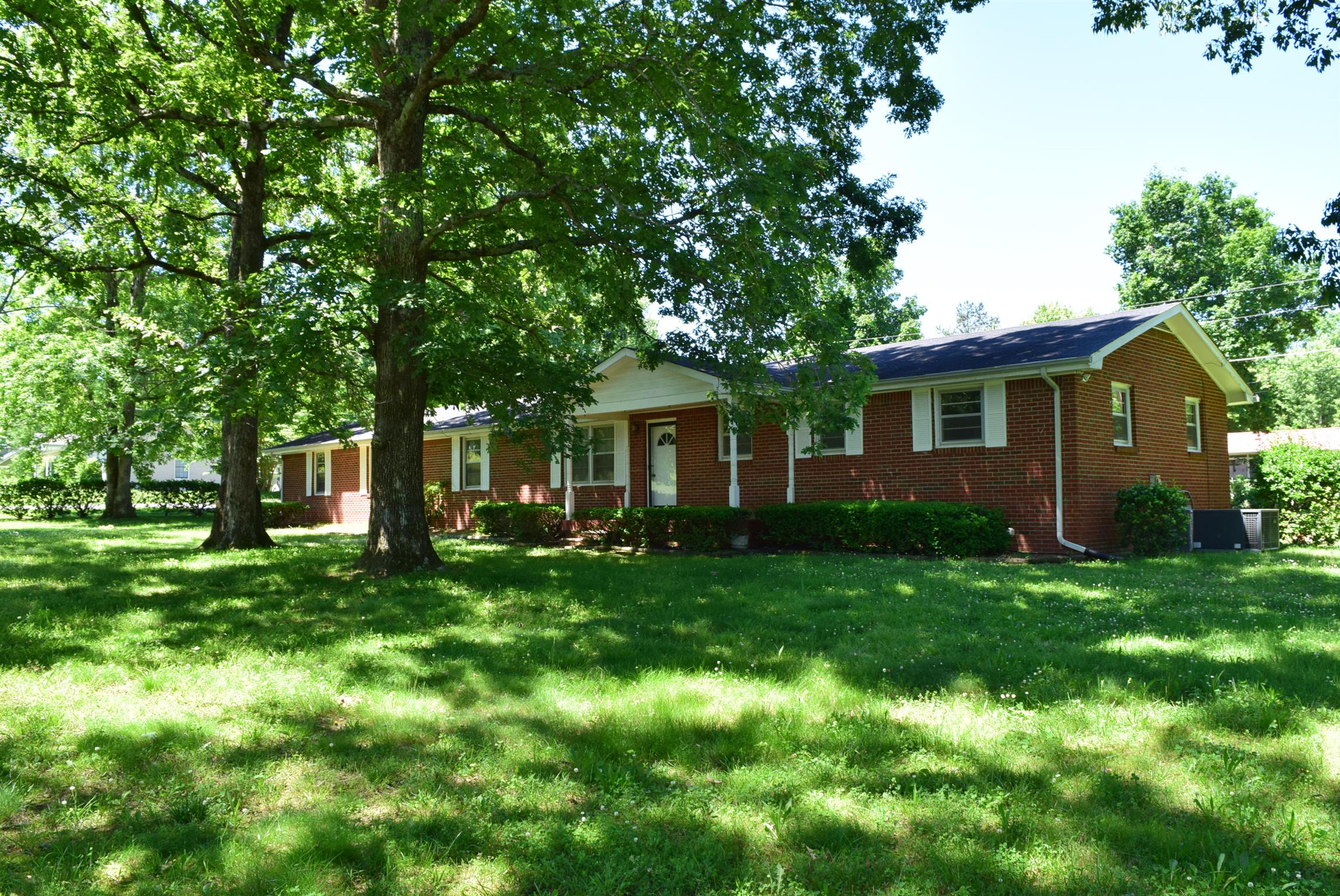 116 Black Road Dickson, TN 37055 - Photo 1 of 21 a view of a house with backyard and garden
