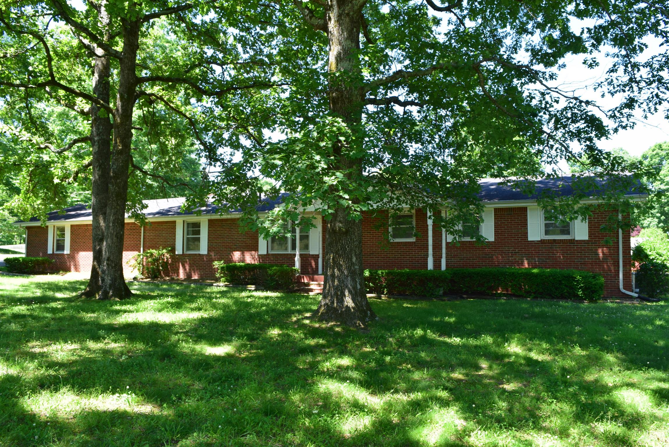 116 Black Road Dickson, TN 37055 - Photo 2 of 21 a backyard of a house with seating space