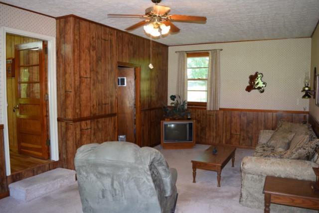 116 Black Road Dickson, TN 37055 - Photo 11 of 21 a spacious bedroom with a bed and a chandelier